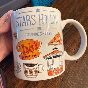 Stars Hollow Ceramic Mug with Orange Accents